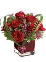 Composizione di rose rosse
